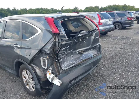 2013 Honda Cr-V Touring z USA, uszkodzony, nr VIN 2HKRM4H95DH103364